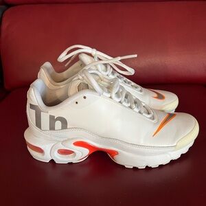 Nike White Sneakers with Orange Highlights